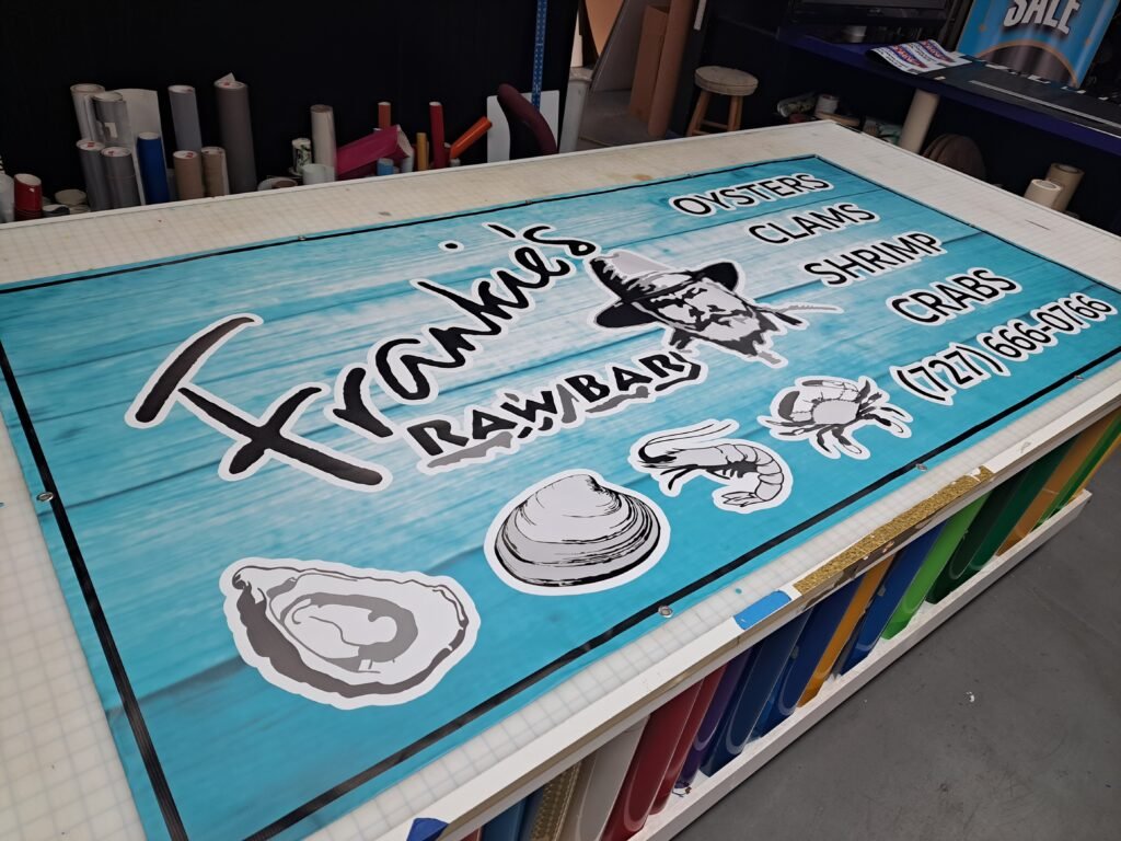 Skywatch Signs promotional banners displayed at Frankie's Raw Bar