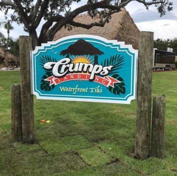 Carved wood sign with dimensional detail by Skywatch Signs