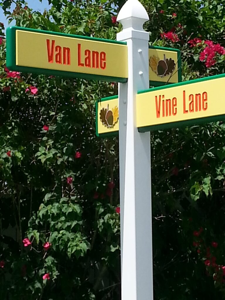 Custom street sign with green background – Skywatch Signs