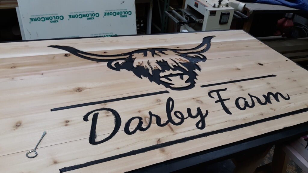Custom Signage – carved-wood-sign by Skywatch Signs.