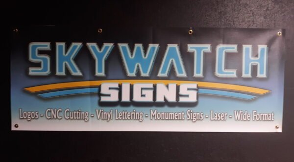 Custom Signage – custom mesh banner by Skywatch Signs.