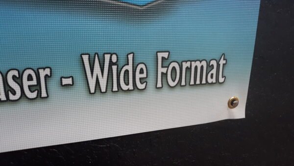 Custom Signage – custom mesh banner by Skywatch Signs.