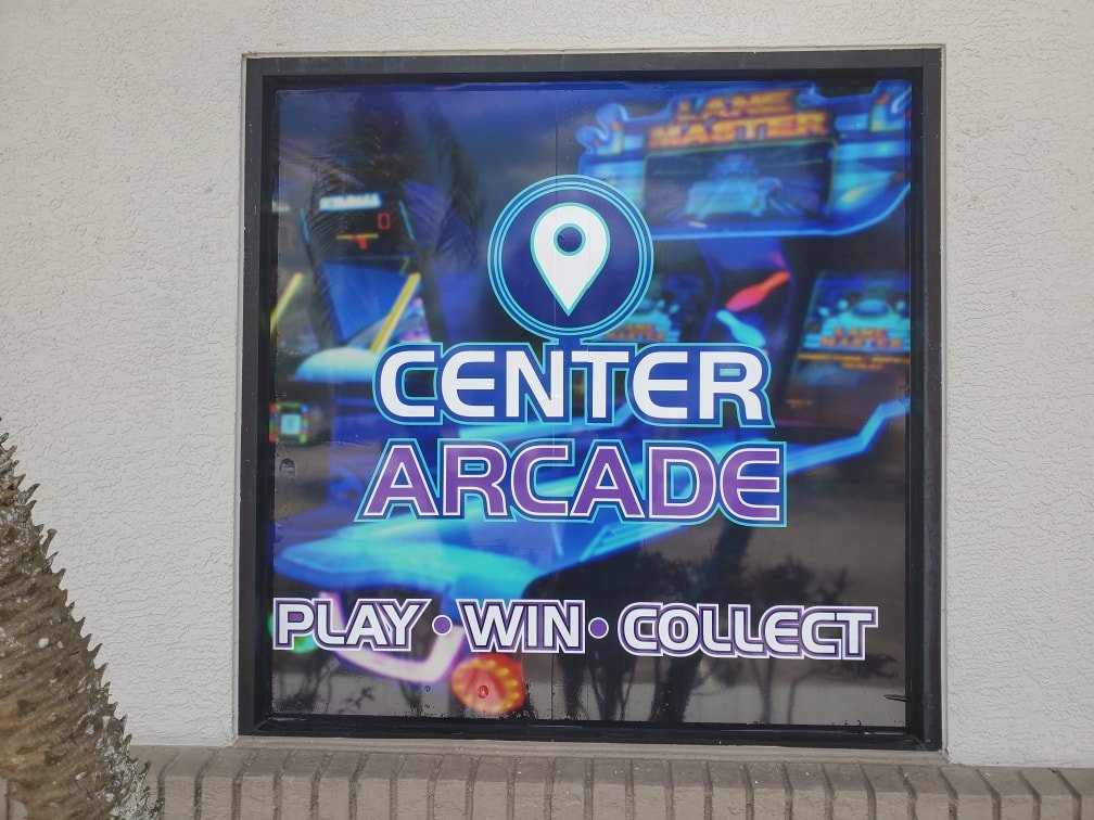Custom Signage –storefront-vinyl-skywatch arcade center
